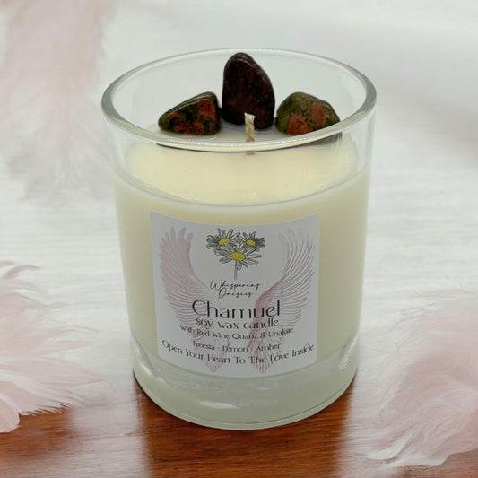 Chamuel Angel Candle in a clear glass jar, topped with red wine quartz and unakite crystals, handmade soy candle from Whispering Daisies in North Devon.

