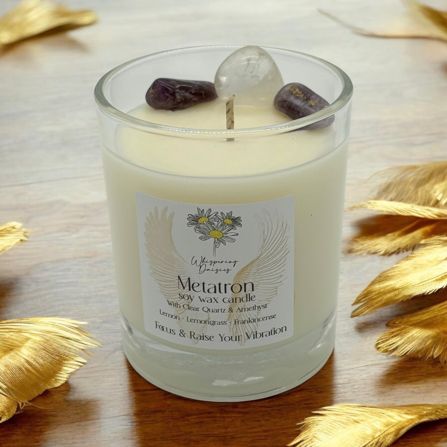 Metatron Angel Candle in a clear glass jar, topped with clear quartz and amethyst crystals, handmade soy candle from Whispering Daisies in North Devon.